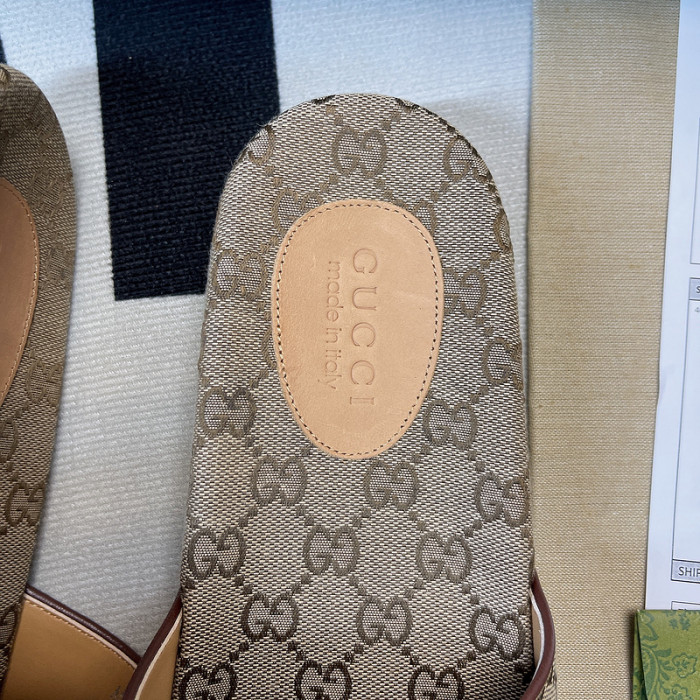G*u*i slippers