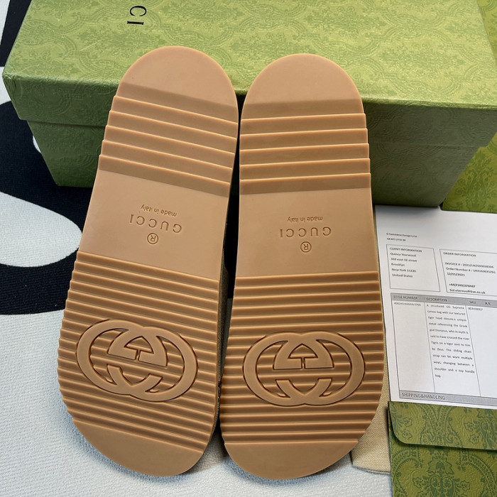 G*u*i slippers