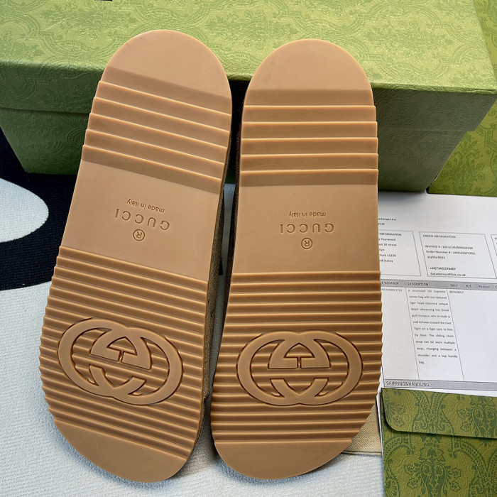 G*u*i slippers