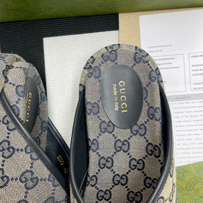 G*u*i slippers