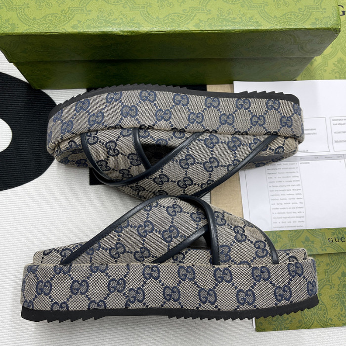 G*u*i slippers