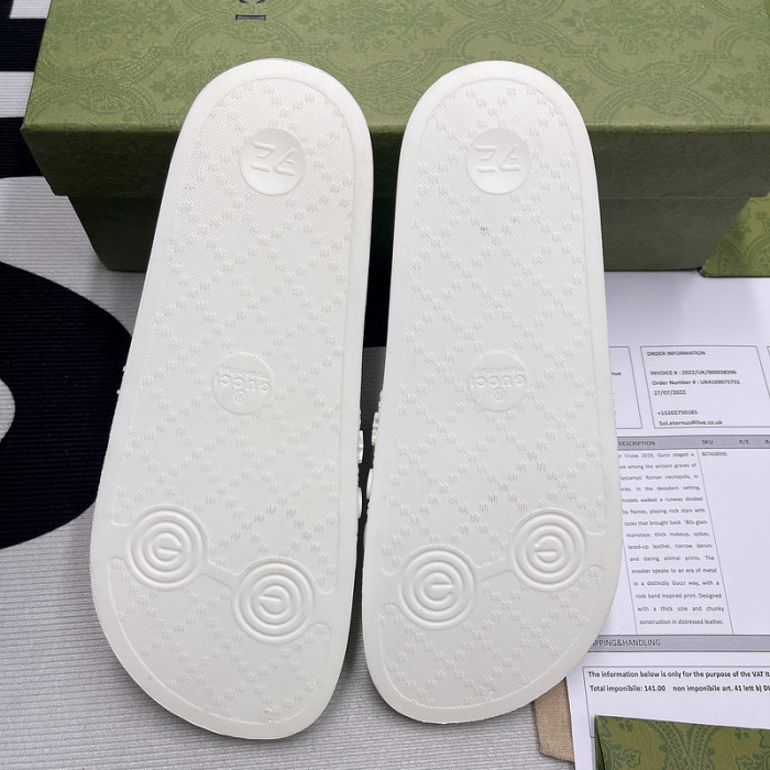 G*u*i slippers