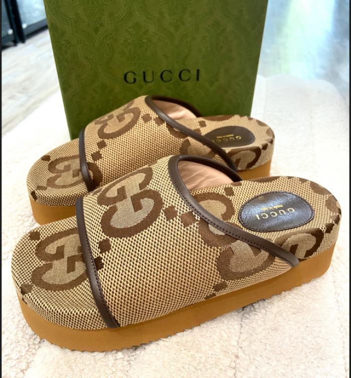 G*u*i slippers